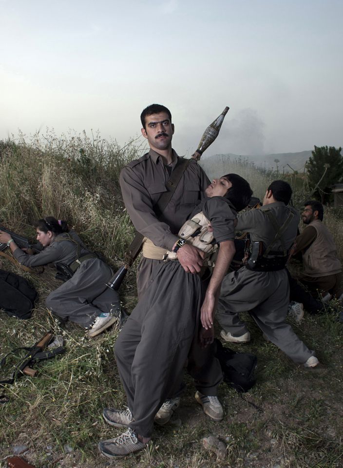 Theater of War, photographs with a group of Iranian-Kurdish guerilla fighters, Lambda print, 100 x 73 cm, Iraq, 2011-2012, Edition 2/9