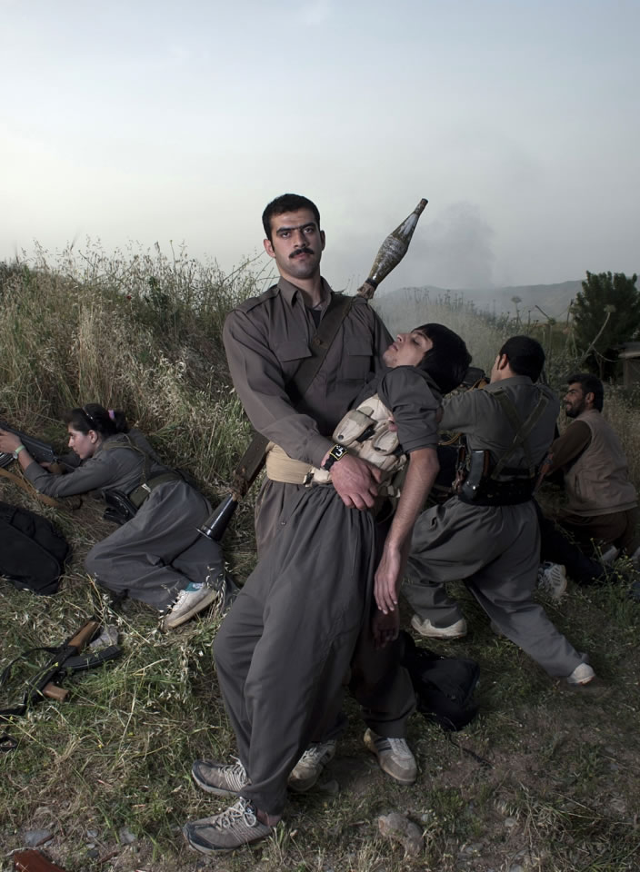 Theater of War, photographs with a group of Iranian-Kurdish guerilla fighters, Lambda print, 100 x 73 cm, Iraq, 2011-2012